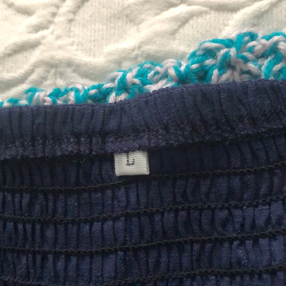 Large, navy blue with non- functioning buttons